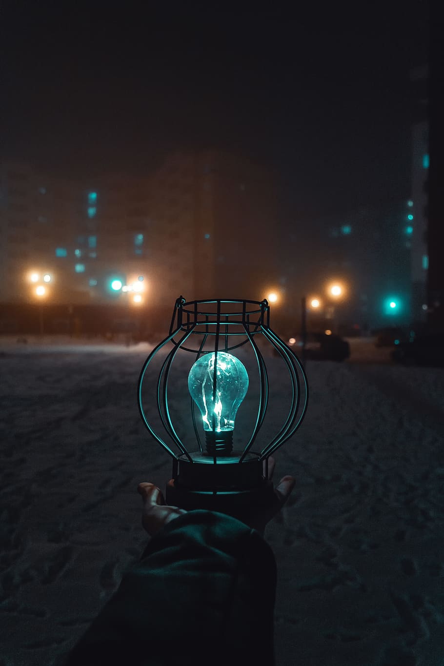 Person Holding Turned-on Light during Nighttime, blur, city, cold HD wallpaper