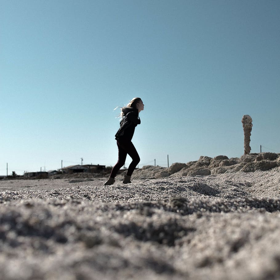 woman jogging on field, person, human, people, sand, beach, blue, HD wallpaper