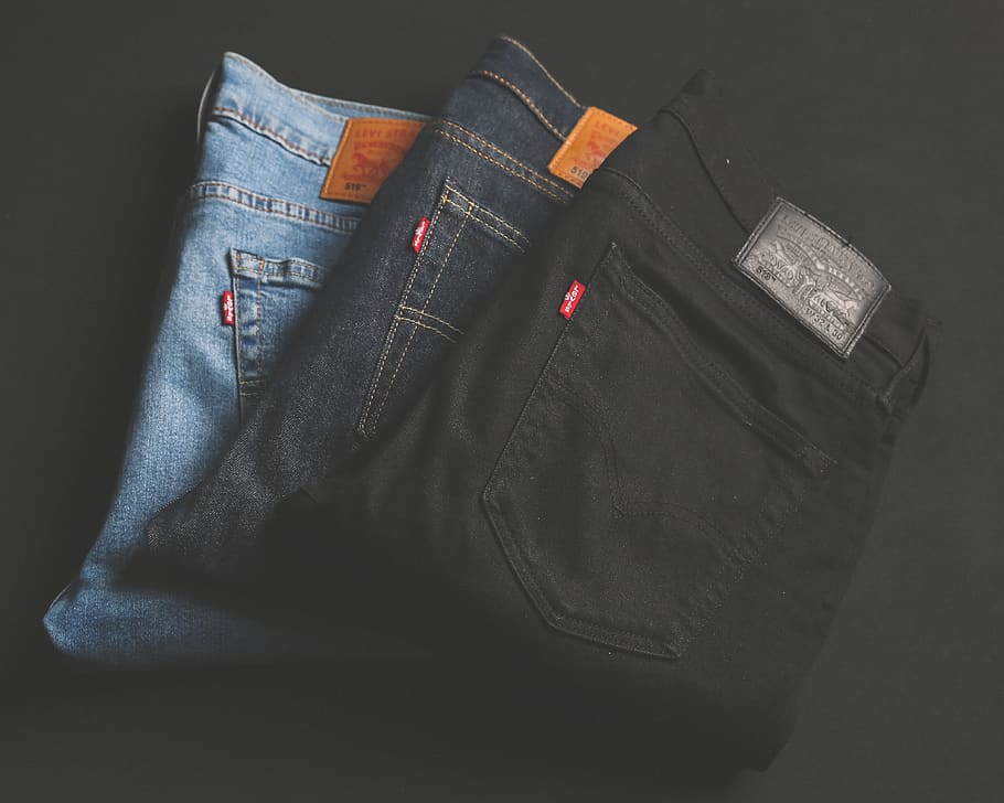 three assorted-color denim bottoms, casual clothing, jeans, indoors HD wallpaper