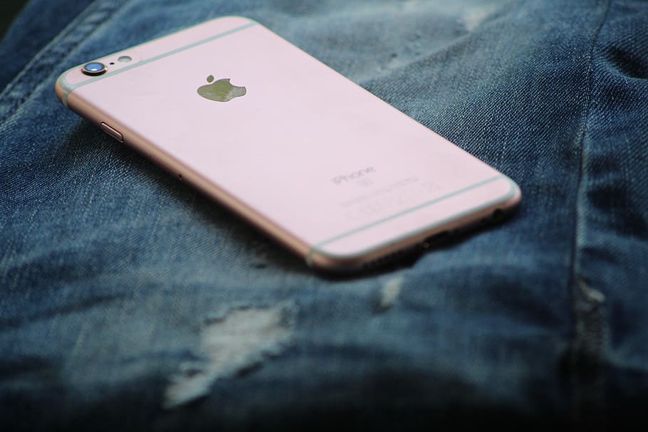 Close-Up Photography of Rose Gold Iphone 6s on Top of Blue Denim Jeans, HD wallpaper