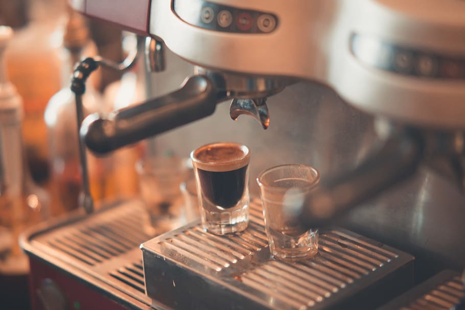 Selective Focus Photography of Espresso Machine, black coffee