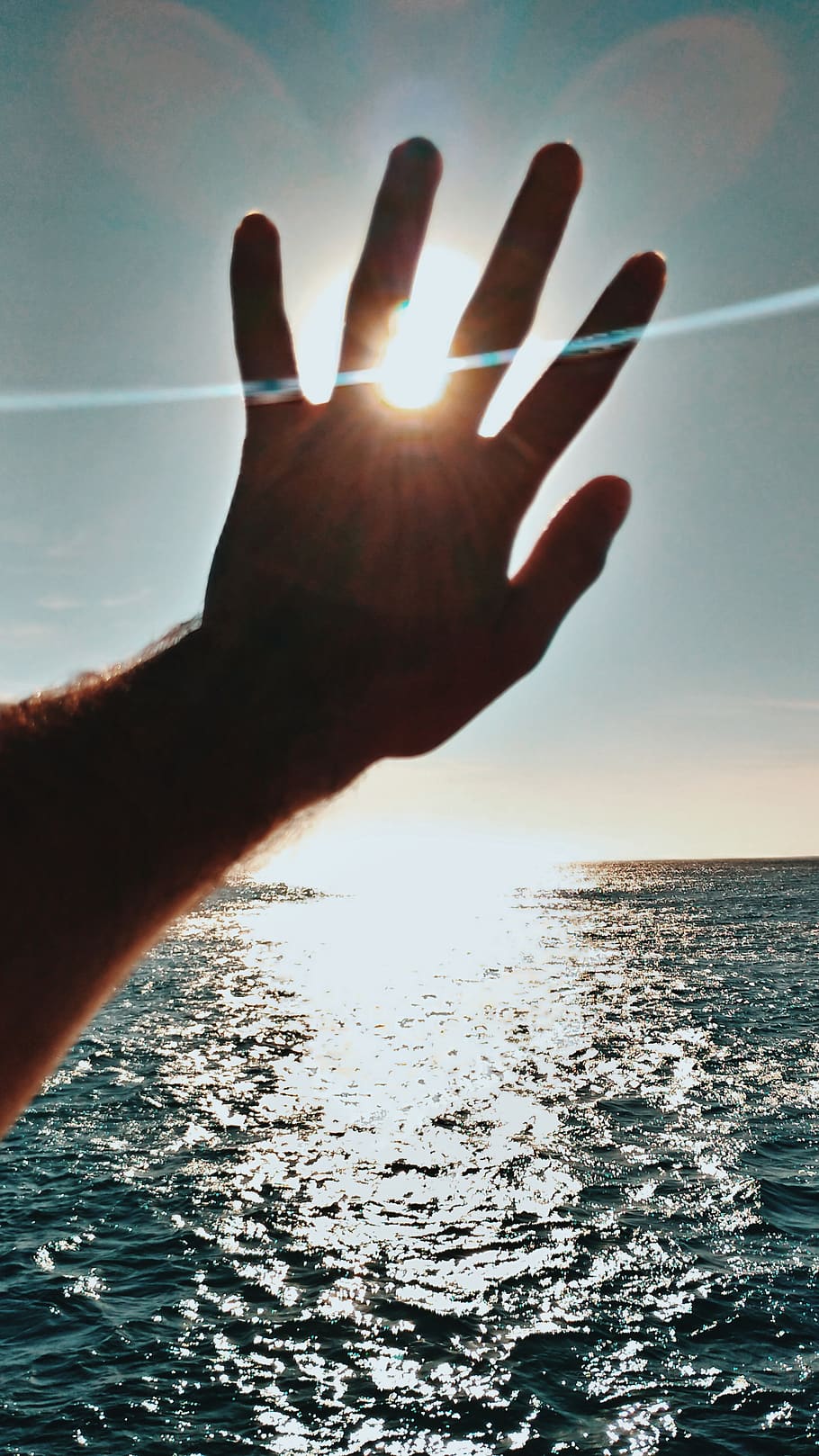 Silhouette Of Hand, backlit, ocean, sea, human hand, sky, human body part HD wallpaper