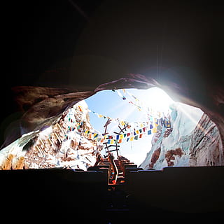 person riding roller coaster entering a hole, ride, cave, rollercoaster HD wallpaper