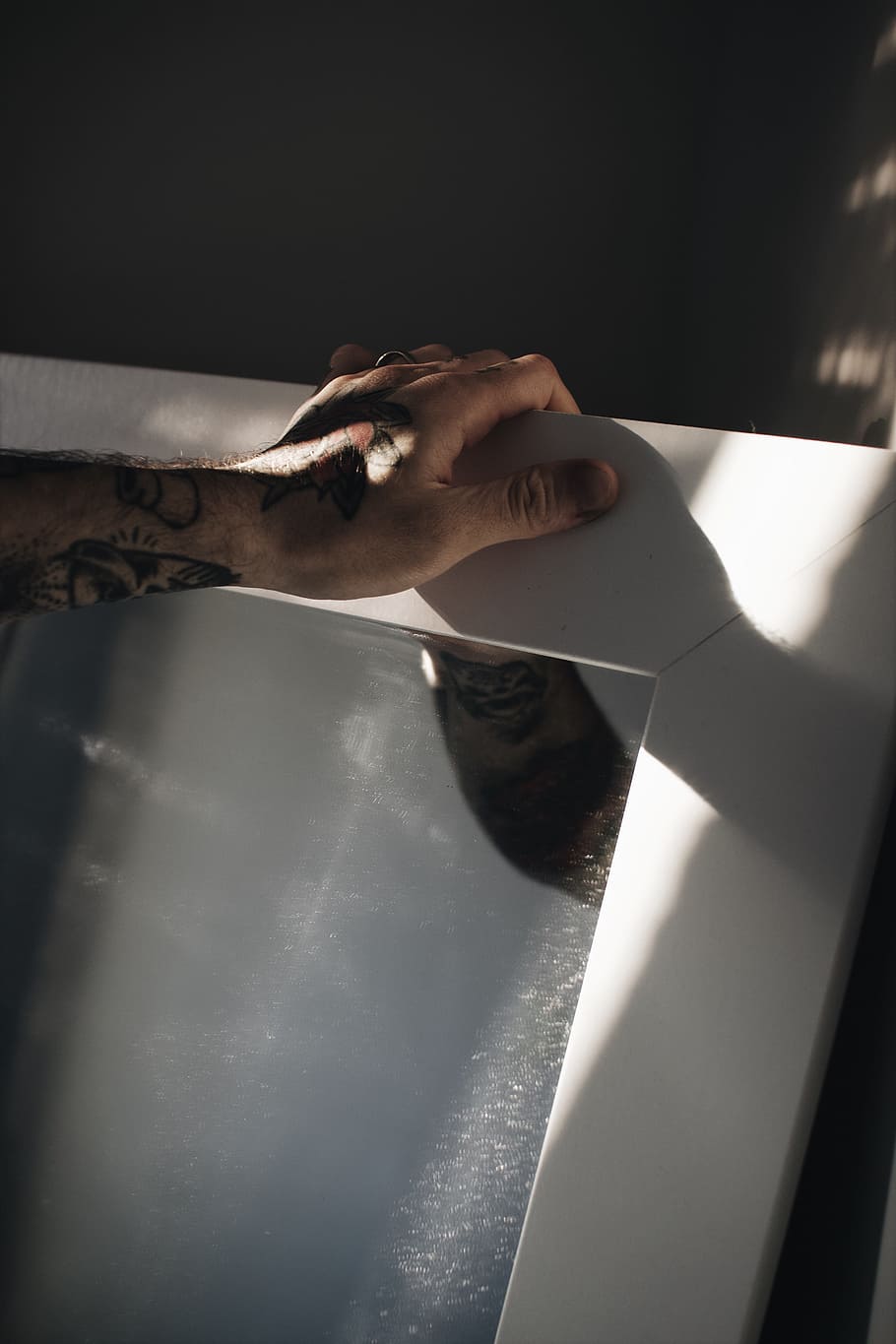 person holding whiteboard, hand, mirror, tattoo, reflection, shadow HD wallpaper