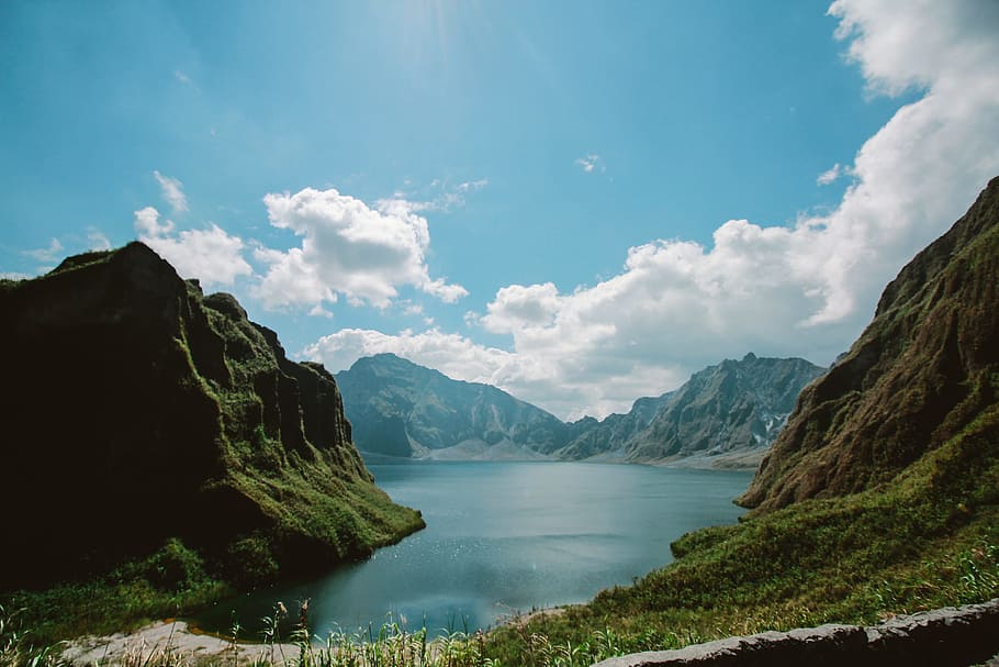 Photo of the Crater of  Mt. Pinatubo, clouds, daylight, environment