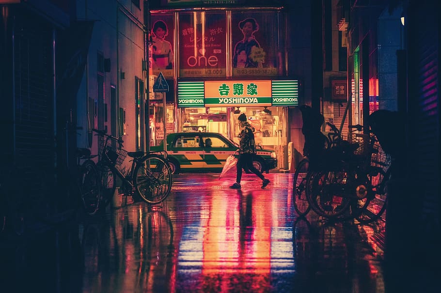Side View of  Woman in Illuminated City at Night, asia, bicycle