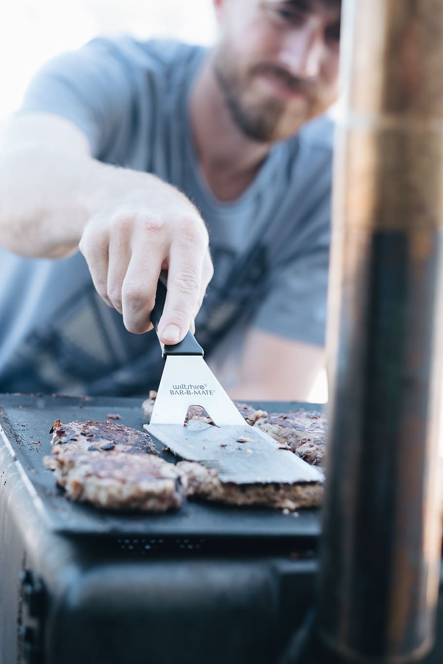 Man In Grey Crew-neck Shirt Frying Burgers, beef, cooking, delicious, HD wallpaper