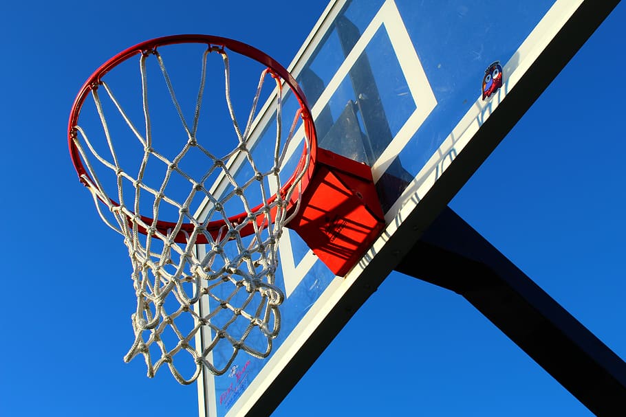 low angle photography of basketball hoop, amusement park, roller coaster