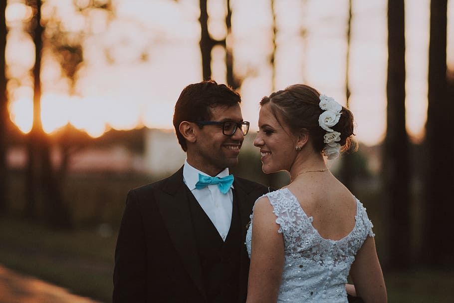 man and women smiling near trees, couple, wedding, forest, folk HD wallpaper
