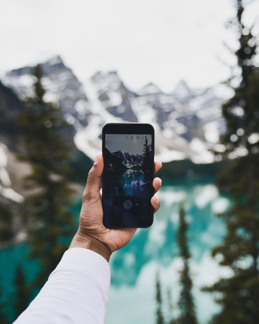 canada, moraine lake, human hand, one person, wireless technology HD wallpaper