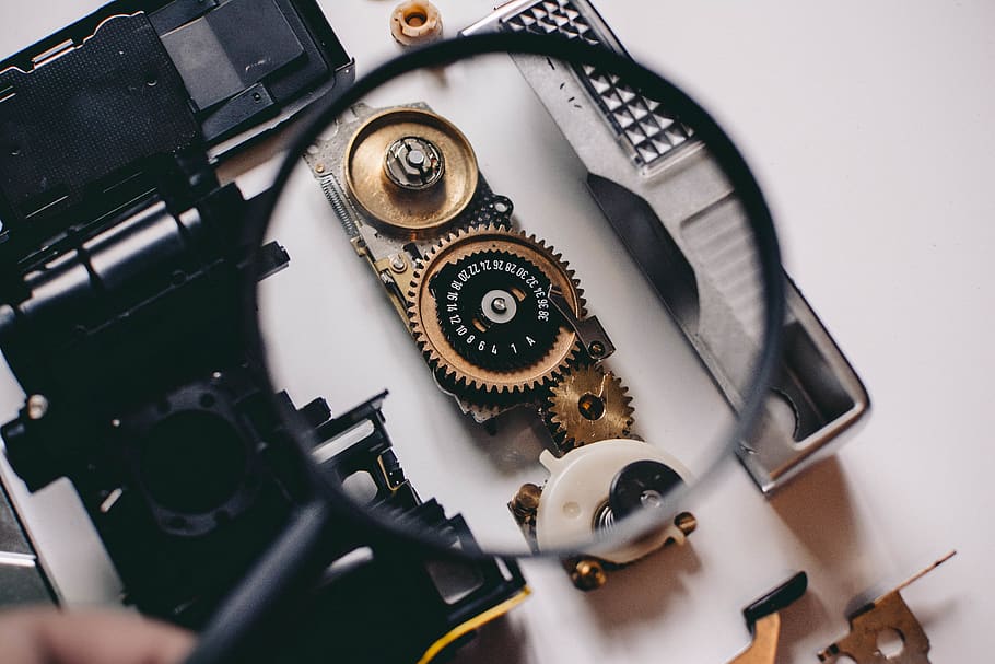 Shallow Focus Photography of Magnifying Glass With Black Frame HD wallpaper