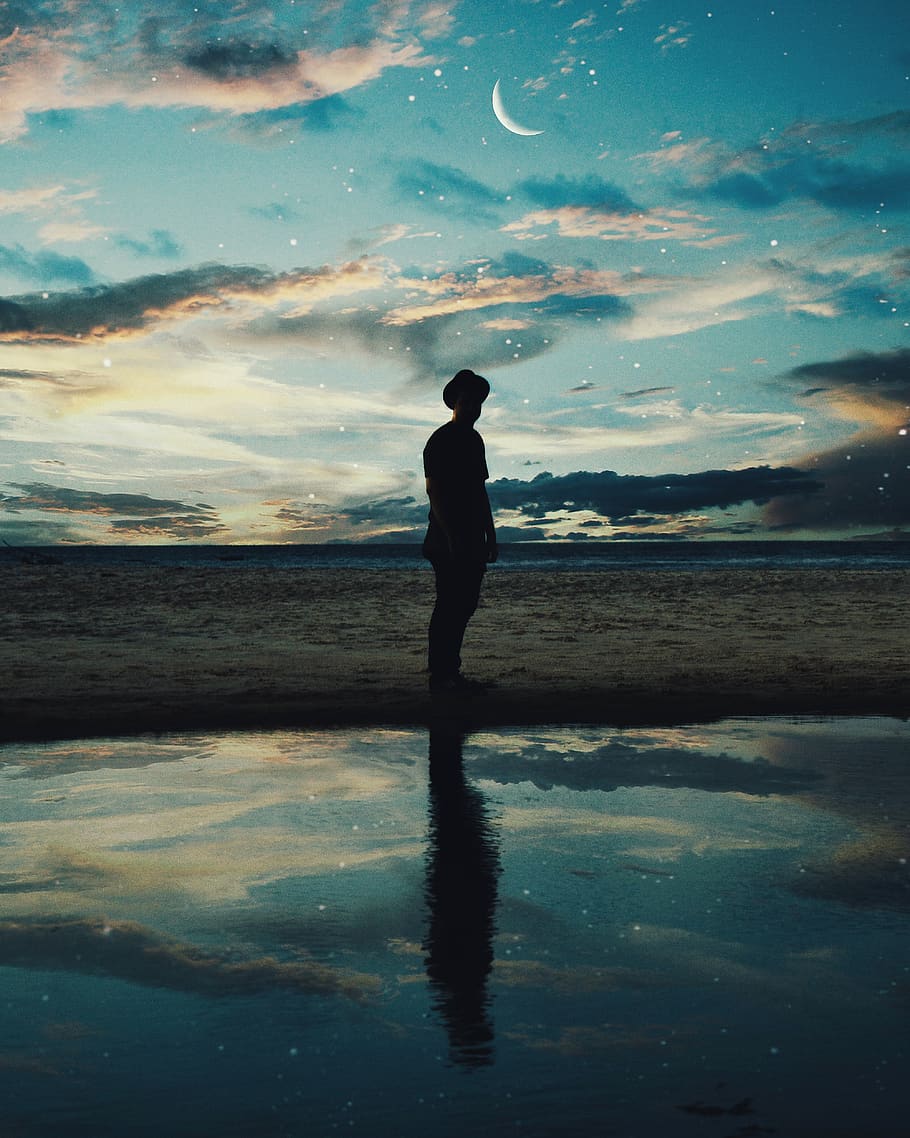 Silhouette of Man Standing Near Body of Water, backlit, beach HD wallpaper