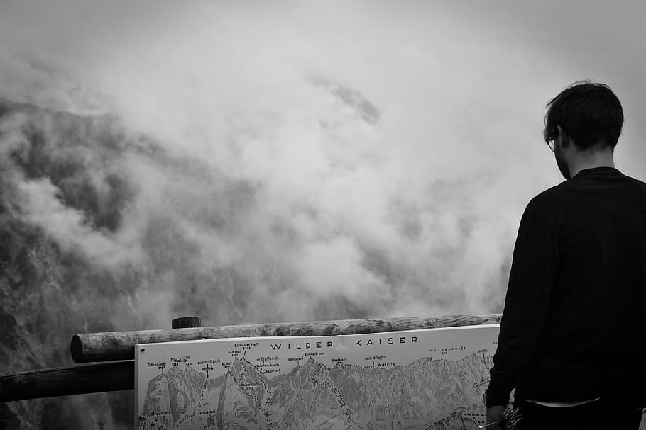 mountain, clouds, man, sign, tag, plate, looking, black and white HD wallpaper