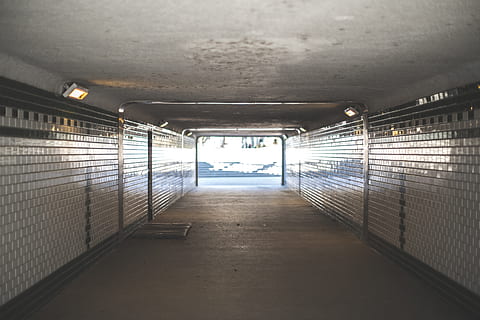 gray garage interior, corridor, flooring, tunnel, bunker, building HD wallpaper