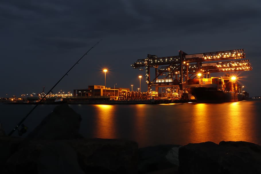 lighted high rise buildings, illuminated, water, night, sky, industry HD wallpaper