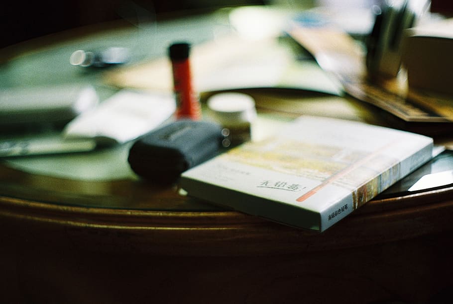 white softbound book on table, indoors, no people, close-up, technology HD wallpaper