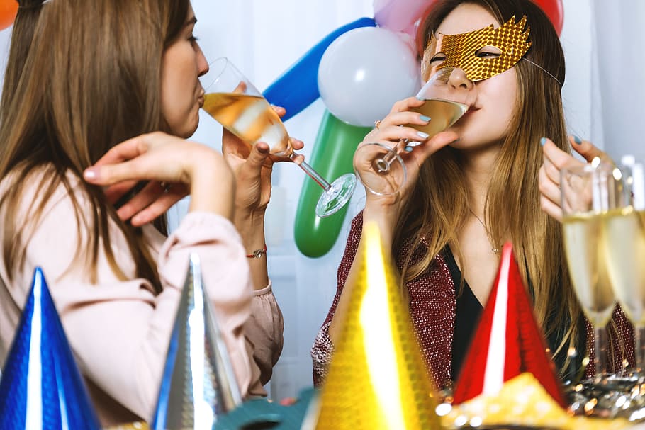 Two young girls celebrate. Happy New Year, women, friendship HD wallpaper