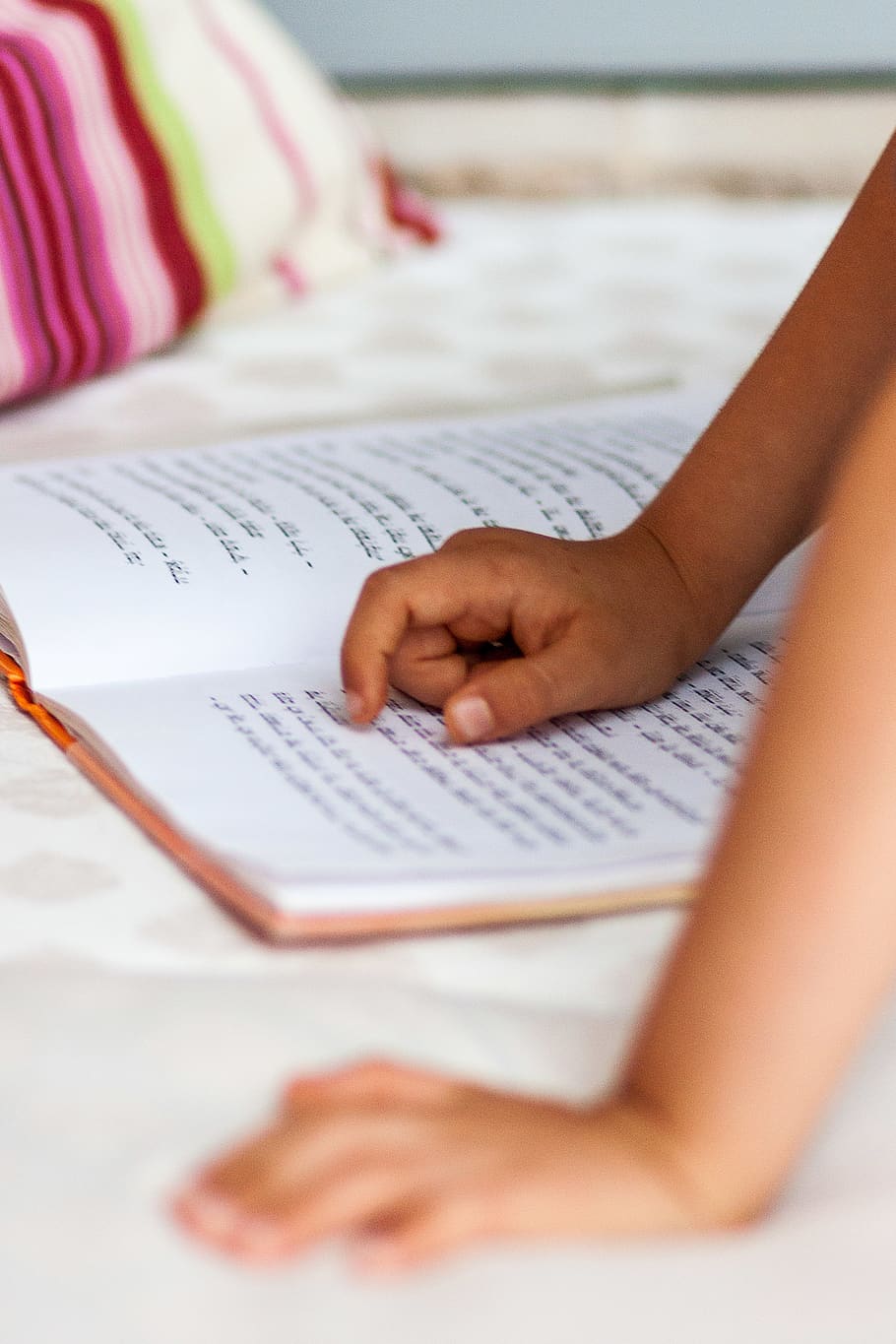 kid's hand pointing on Devanagari script book, reading, text HD wallpaper