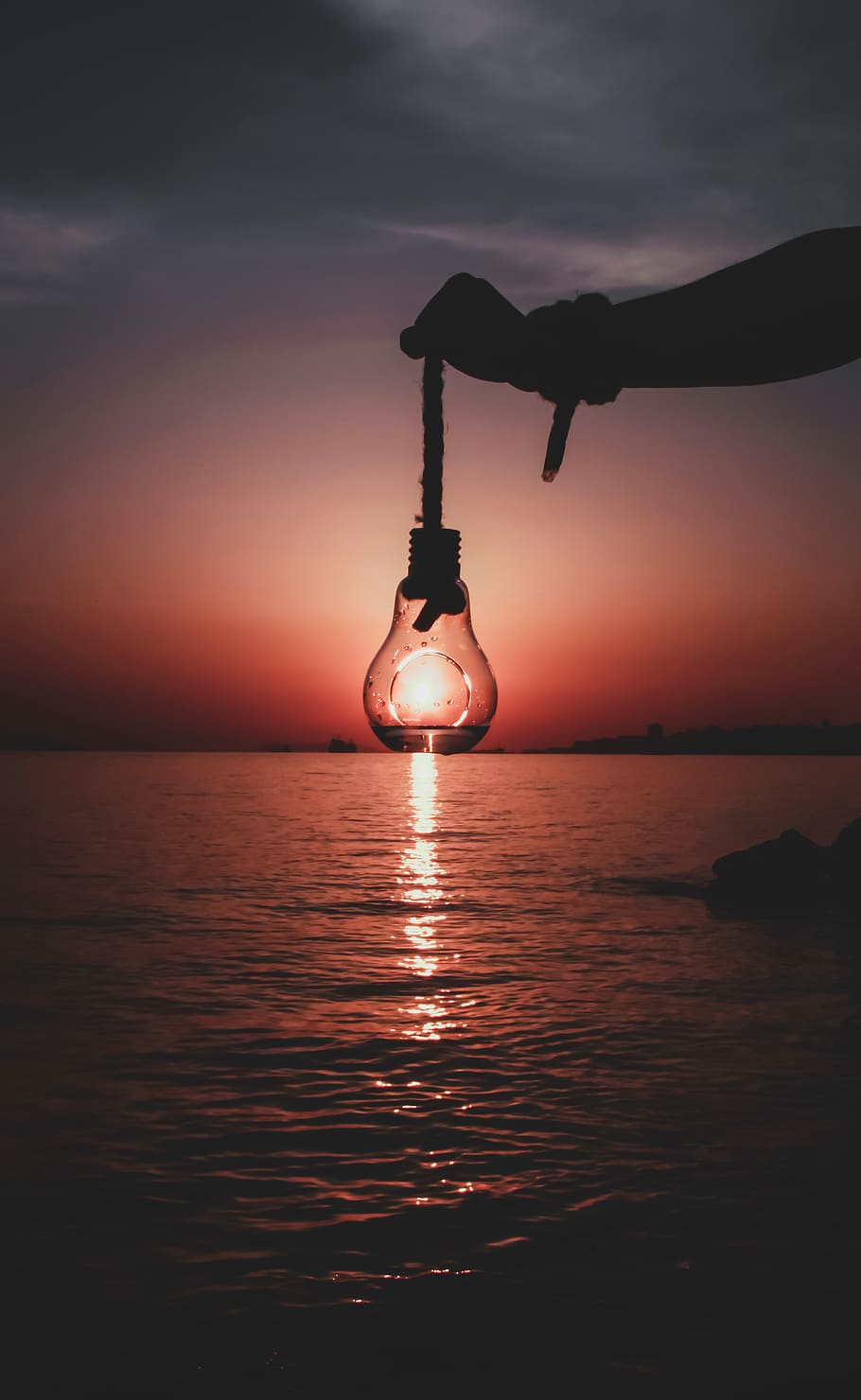 Person Holding Light Bulb, backlit, beach, dark, dawn, dusk, evening HD wallpaper