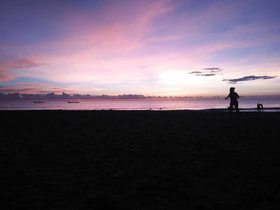 Silhouette of Person Near Sea, beach, boats, clouds, evening HD wallpaper