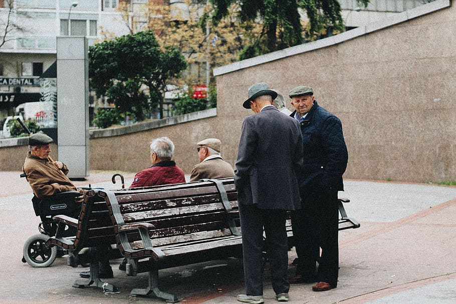 man sitting on bench, men, architecture, group of people, adult HD wallpaper