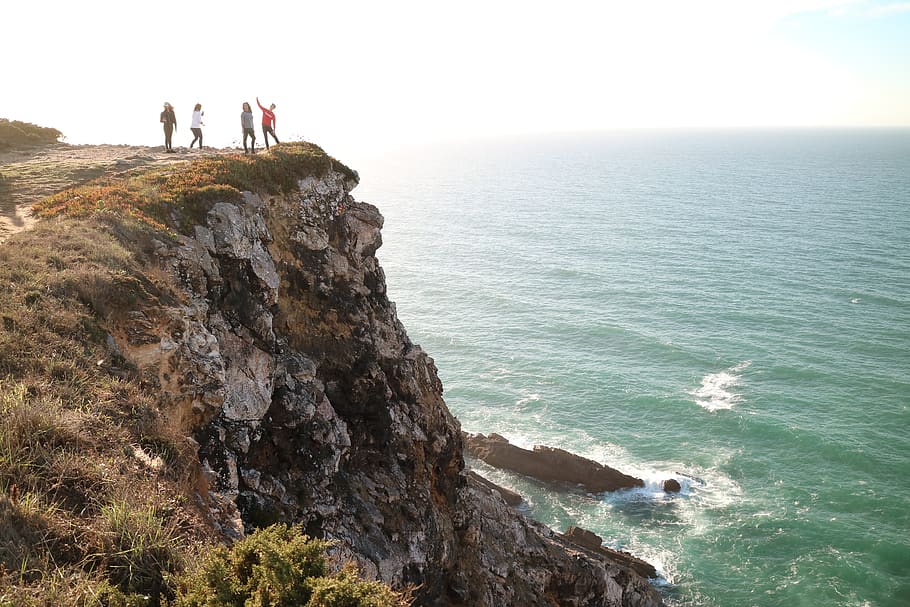 four persons standing on the cliff, sea, water, beauty in nature HD wallpaper