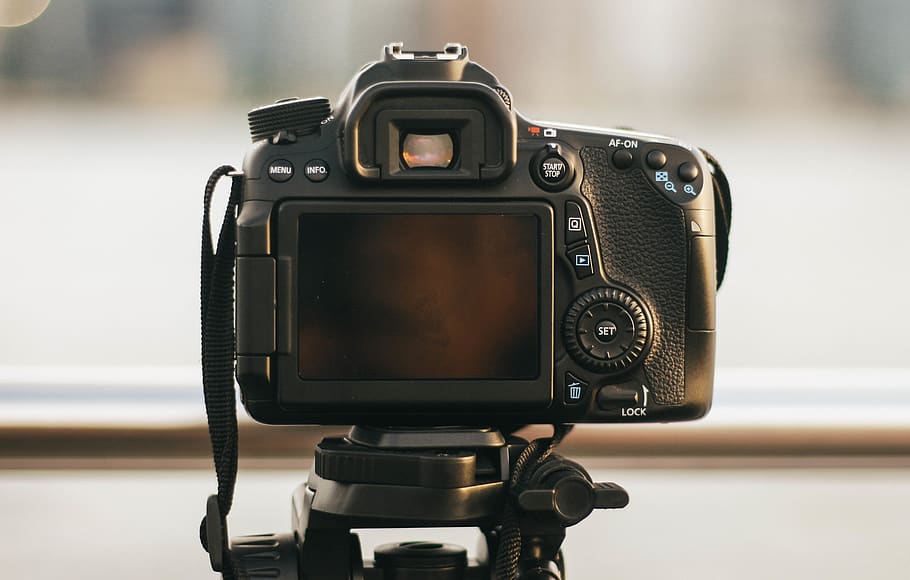 black DSRL camera, electronics, tripod, strap, viewfinder, gear HD wallpaper