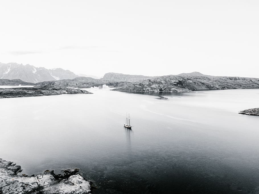 grayscale photography of boat near mountain, water, tranquil scene HD wallpaper