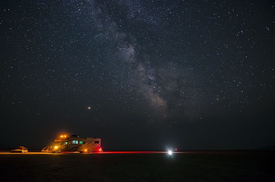 cars on park under clear night sky, camper, campervan, camping