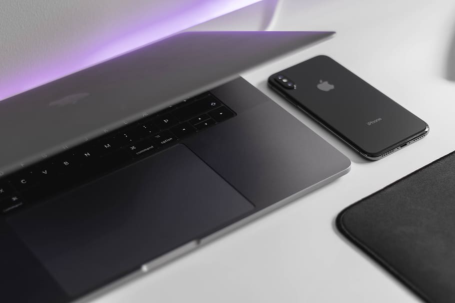 black laptop computer beside post-2018 iPhone, electronics, cell phone HD wallpaper
