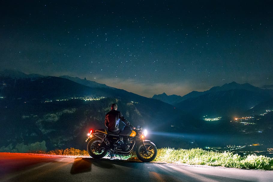 man siting on motorcycle at night, transportation, mode of transportation HD wallpaper