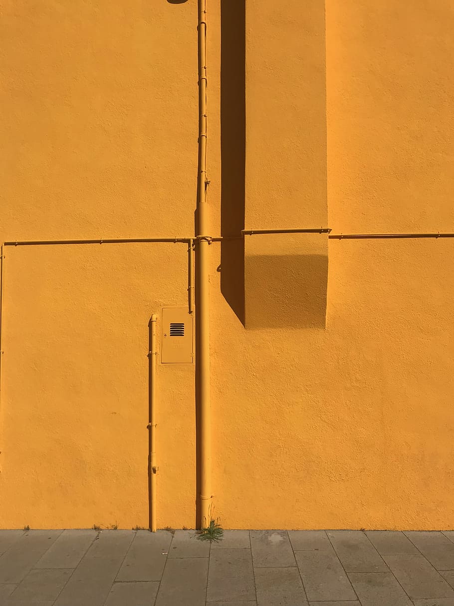 orange concrete wall, building, drainpipe, street, modern design HD wallpaper
