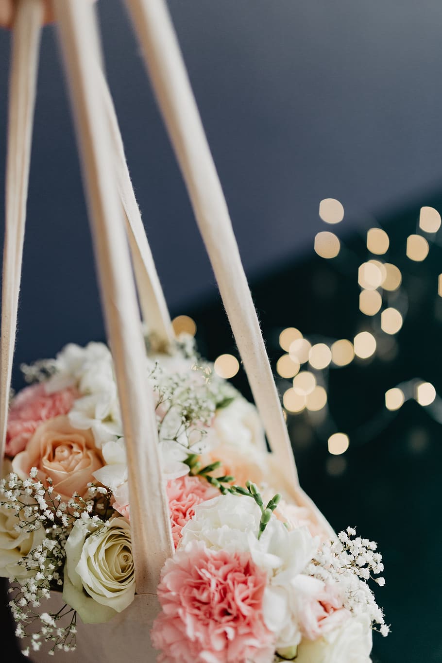 Bouquet of flowers in a bag with some fairy lights, roses, flora HD wallpaper