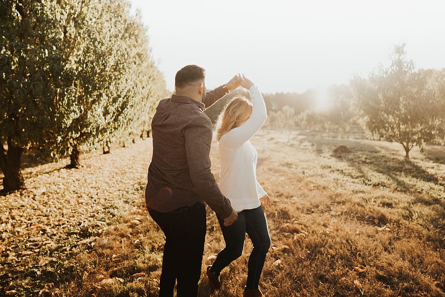 couple dancing near trees, apparel, clothing, human, person, pants HD wallpaper