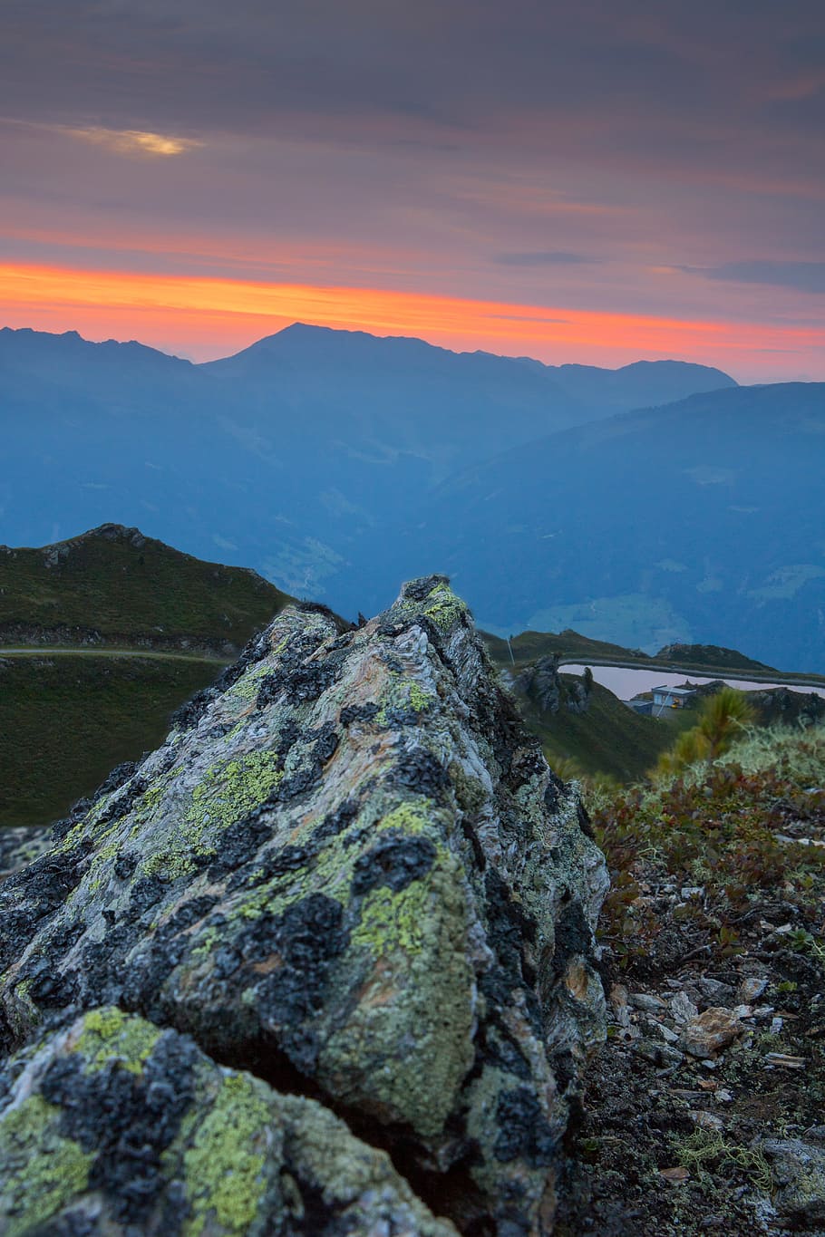 person taking photo of green and black stone, sunset, mountain HD wallpaper