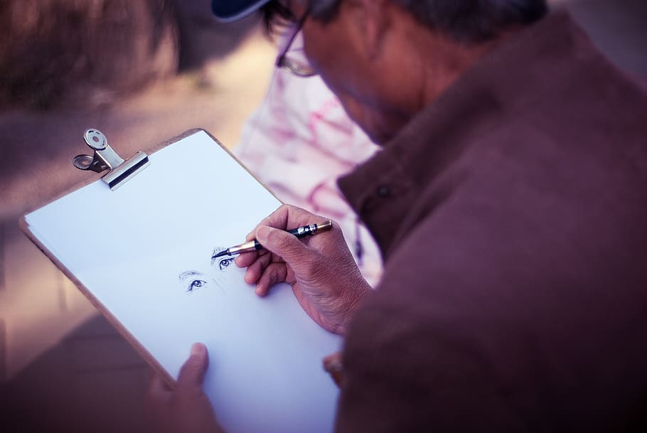 man sketching face on white printer paper, art and craft, creativity HD wallpaper