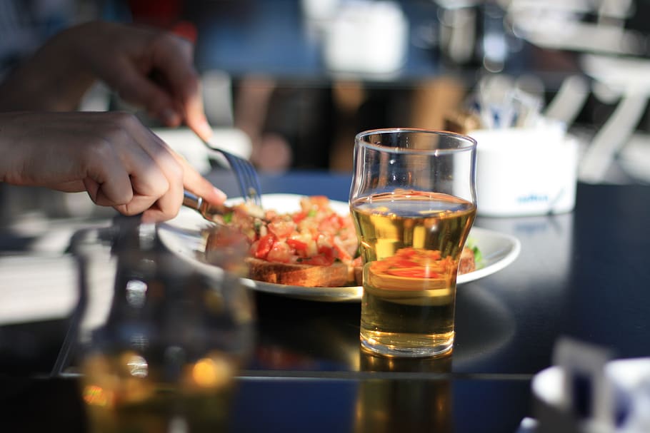 Pilsner Glass With Beer Beside White Plate, dinner, drink, drinking glass HD wallpaper