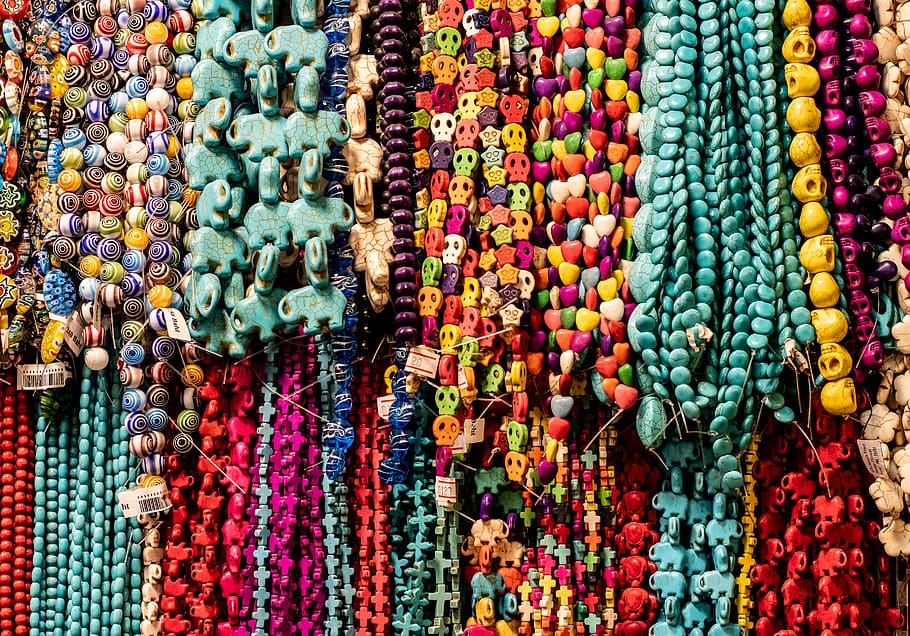 Various colorful beads in the market Wallpaper background of a colorful  necklace made of precious stones and colored beads Semiprecious jewelry  Stock Photo  Alamy