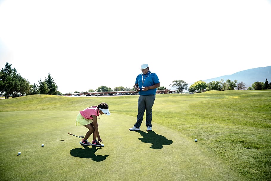 Man Standing Beside Girl Picking Ball, caddie, course, drive HD wallpaper