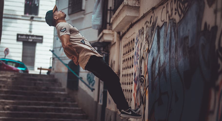 man jumping near wall, algeria, human, person, people, car, automobile, HD wallpaper