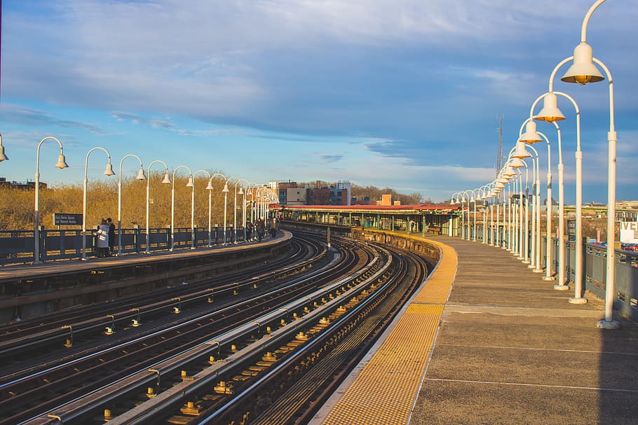 Train Railroad With White Light Posts Beside It, daytime, lamp posts HD wallpaper