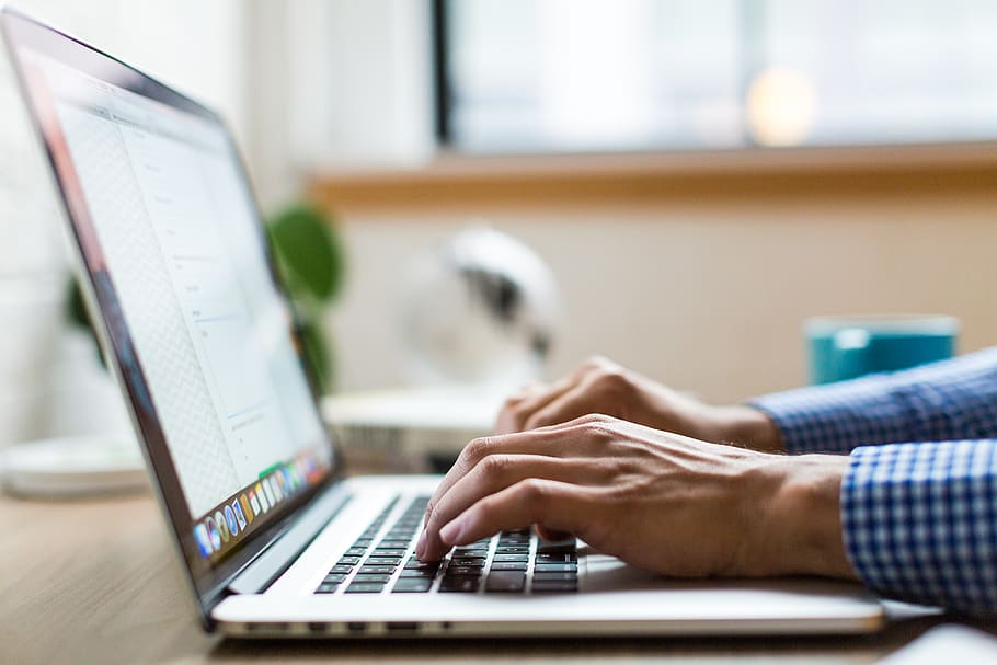 Person Using Macbook, adult, connection, desk, electronics, hands HD wallpaper