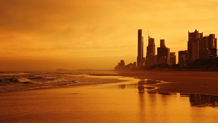 Sea Waves Near High-rise Building, backlit, beach, dawn, evening HD wallpaper