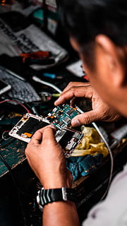 man repairing Android smartphone, technology, electronics industry HD wallpaper