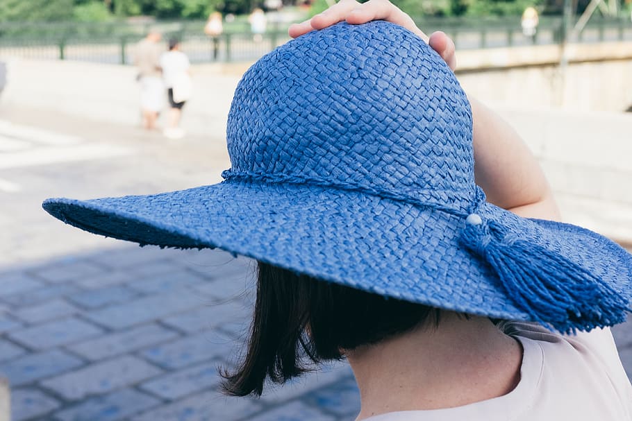 Girl holds her blue hat, background, beautiful, beauty, colorful