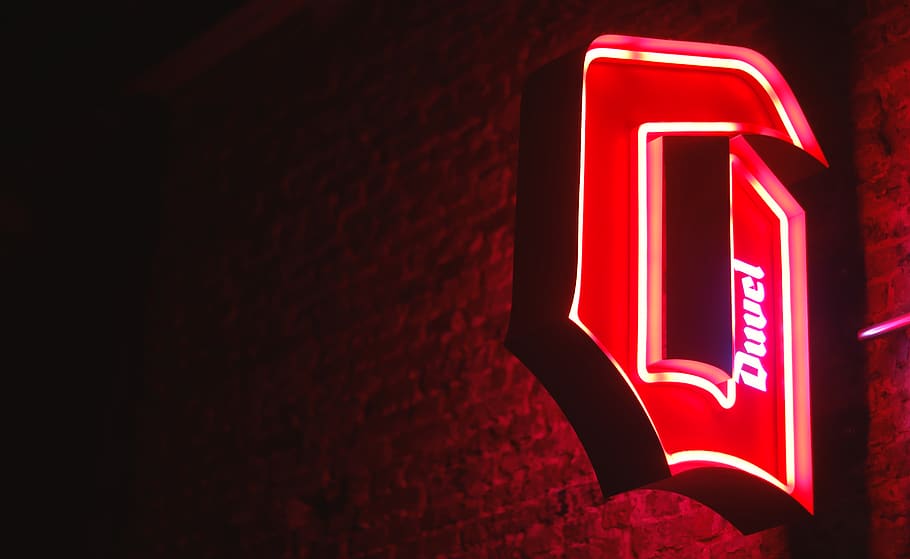 red Duvel neon signage, alphabet, text, light, symbol, wall, trademark
