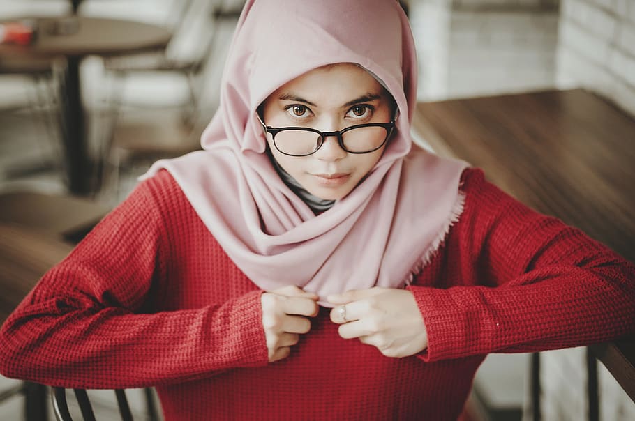 selective focus photography of woman wearing pink hijab, clothing