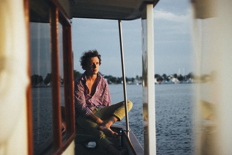 guy, man, shirt, checkered, pants, water, boating, sea, people HD wallpaper