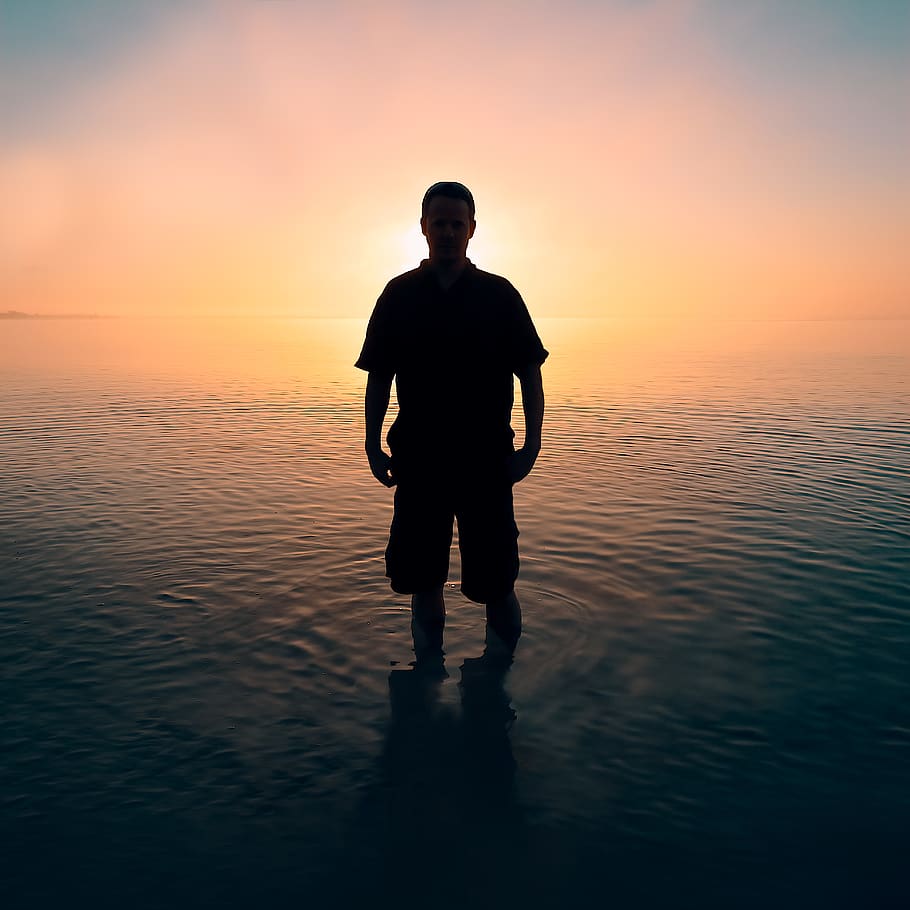 Silhouette Of Man, backlit, beach, dawn, ocean, person, sea, sky HD wallpaper