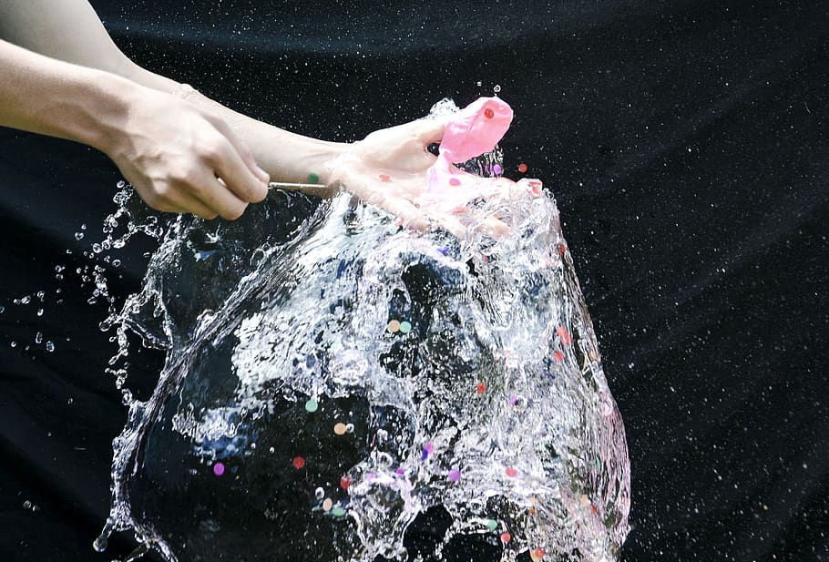 Person Playing With Water Balloon, liquid, splash, splashing HD wallpaper